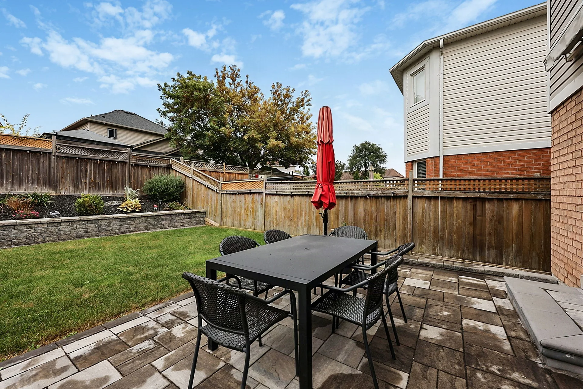 Landscaped backyard at 17 Holman Court