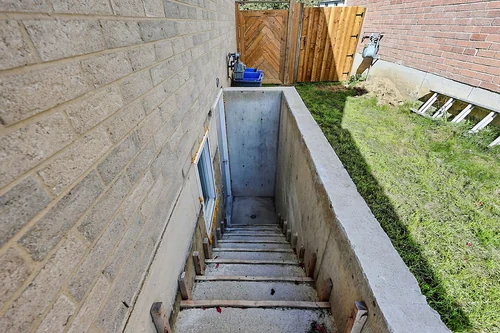Separate basement entrance stairs